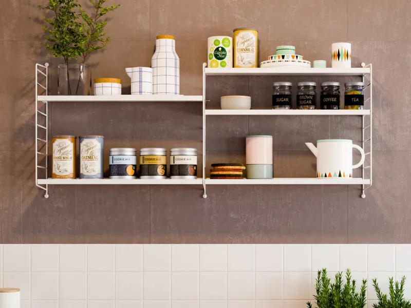 Repisa Vintage de Ducasse en la pared de una cocina
